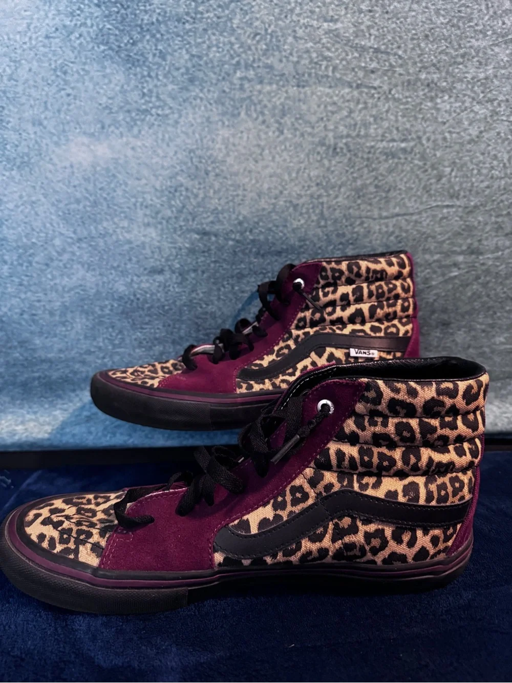 Vans High Top Skate Shoes in Black with Leopard Trim and Burgundy Accents